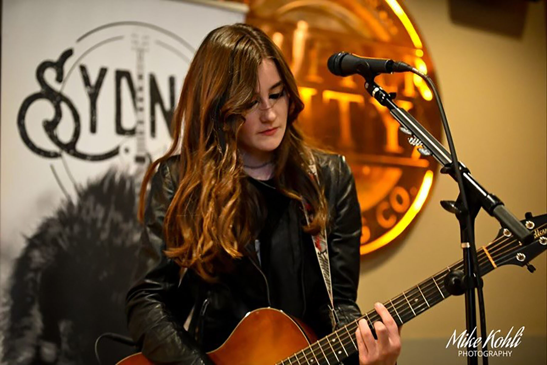 sydney irving playing guitar color